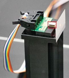 Fig6：Ultra-small Light Source On-display at the Booth; Succeeds in Miniaturization 1\100th the Size of Conventional Light Sources
