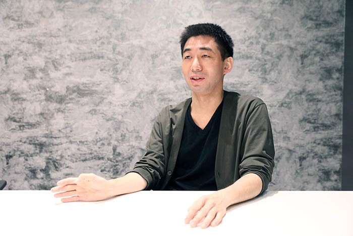 Dr. Watanabe being interviewed