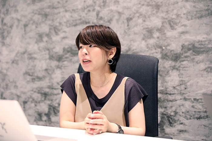 Ms. Hayashi being interviewed